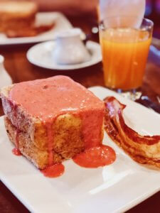 Breakfast at Kona Cafe at Disney's Polynesian Resort is the best way to start your day before hopping the monorail over to the Magic Kingdom! #disneyworld #disneyfood #polynesianresort #magic kingdom Tonga Toast | Disney | Walt Disney World | Disney Resorts | Disney Restaurants | Disney Breakfast | WDW | Disney Dining | Ohana | Best Disney Food | Disney World Restaurants | Disney World Food 