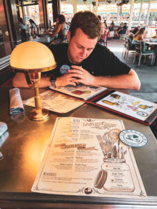 A Pixar-themed restaurant bar at Disney's California Adventure at Disneyland resort! Everything you need to know about the food, drinks, and Pixar details at Lamplight Lounge #disneyland #dlr #dca #disneycaliforniaadventure #disney Disney food | Disney restaurants | disneyland food | Lamplight lounge | best dinner at disneyland | best lunch at disneyland | bars at disneyland | pixar restaurant at disneyland | pixar bar at disneyland | disney eats | disney dining | disney food tips 