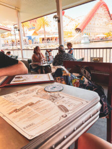 A Pixar-themed restaurant bar at Disney's California Adventure at Disneyland resort! Everything you need to know about the food, drinks, and Pixar details at Lamplight Lounge #disneyland #dlr #dca #disneycaliforniaadventure #disney Disney food | Disney restaurants | disneyland food | Lamplight lounge | best dinner at disneyland | best lunch at disneyland | bars at disneyland | pixar restaurant at disneyland | pixar bar at disneyland | disney eats | disney dining | disney food tips 