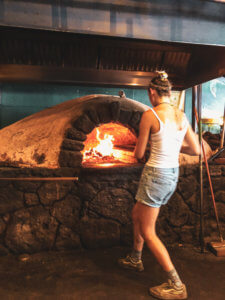 The beautiful coastal town of Paia sits along the North Shore of Maui, mixing hip surf culture and exotic jungle living with the Road to Hana beginning in this little town. In Paia, you will find the best beach in Maui with sea turtles and windsurfing, shops, boutiques, and unique restaurants. #maui #paia #hawaii #seaturtle Paia | Maui | Hawaii | Things to do in Paia | Things to do in Maui | Where to go in Maui | Sea turtles in maui | Things to do in hawaii | where to go in hawaii | Road to Hana