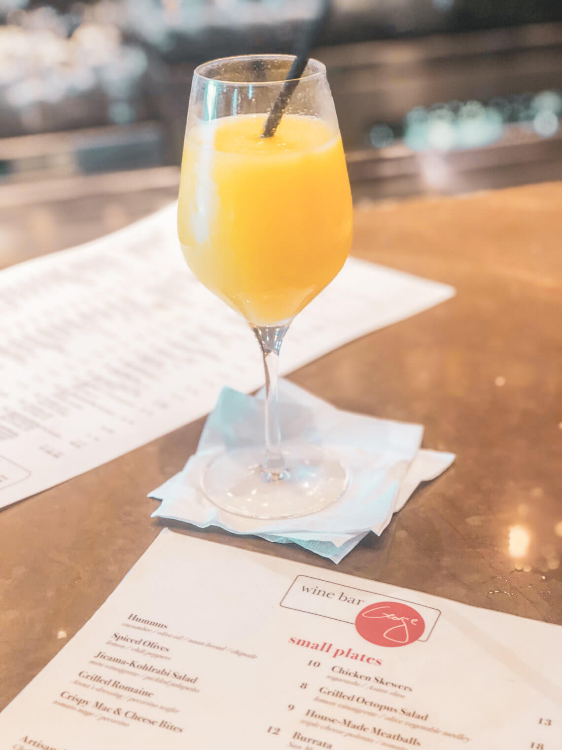 Found in the heart of Disney Springs is Wine Bar George, a quaint estate-style wine bar run by Master Sommelier George Miliotes. With an expansive wine list (by bottle, glass, and ounce), Wine Bar George is every bit elegant, yet cozy. Friendly and knowledgeable servers, light eats, and the iconic Dole Whip frozcato are just a few things that await you when dining at the award-winning restaurant. Walt Disney World | Disney food | disney dining | disney restaurants #disneyfood #disneydining